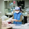 Les entreprises vietnamiennes ont une capacité suffisante pour produire de masques anti-épidémiques