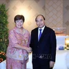 APEC : le président Nguyen Xuan Phuc rencontre des dirigeants de Hong Kong (Chine) et du FMI