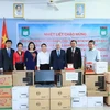 Le président du CC du FPV rend visite à l'école bilingue vietnamo-lao Nguyên Du