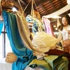Défilé de mode pour présenter la soie et les brocatelles de Lam Dong