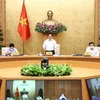 Le Premier ministre Pham Minh Chinh préside la réunion périodique du gouvernement en août