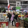 Товары в супермаркете удовлетворяют потребности населения. (Фото: Дык Зюи/Vietnam+)