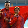 Радость Нгуен Тхи Тхань Фук (золотая медаль в ходьбе на 20 км среди женщин) и ее брата Нгуен Тхань Нгынг (бронзовая медаль в ходьбе на 20 км среди мужчин). (Фото: ВИА)