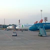 Самолеты Vietnam Airlines в международном аэропорту Нойбай в Ханое (Фото: ВИА)