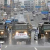 Военные машины ЮК проводят деинфекцию дороги в городе Тэгу, примерно в 300 км к юго-востоку от Сеула, 29 февраля (Фото: AFP/ВИА)