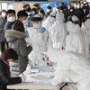 Люди стоят в очереди на тест на COVID-19 в Сеуле, Корея, 10 марта 2020 года. (Фото:Синьхуа/ВИА)
