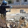 Сотрудник ООН, изучающий химическое оружие в Сирии в 2013 году. (фото AP)