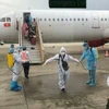 Распыление дезинфицирующего средства в аэропорту (Источник: baoquocte.vn)