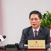 Министр промышленности и торговли Чан Туан Ань выступает на видеоконференции (Источник: www.qdnd.vn)