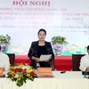 Председатель НС Нгуен Тхи Ким Нган (в центре) выступает на конференции 11 июля (Фото: ВИА)