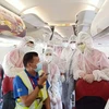 Пассажиры этих рейсов - туристы, в том числе множество детей, застрявших в Дананге из-за социального дистанцирования в городе (Фото: Vietjet)