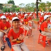 Школьники на церемонии открытия 2019-2020 учебного года в средней школе Фан Чау Чинь в городе Дананг (Фото: ВИА)