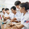 Студенты, занимающиеся исследованиями в Университете Тон Дык Тханг (Источник: en.nhandan.org.vn)