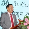 Посол Вьетнама в Лаосе Нгуен Ба Хунг выступает на мероприятии, посвященном 75-летию традиционных сил общественной безопасности и 15-летию кампании “Все население защищает национальную безопасность” (19 августа). (Фото: ВИА)