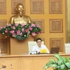 Заместитель премьер-министра Вук Дук Дам председательствует на заседании национального руководящего комитета по профилактике и борьбе с COVID-19 в Ханое 20 августа. (Фото: ВИА)