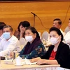 Председатель Национального собрания Нгуен Тхи Ким Нган (первая справа) и постоянный заместитель председателя Тонг Тхи Фонг (второй справа) на мероприятии (Фото: ВИА)