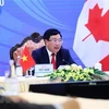 Заместитель премьер-министра и министр иностранных дел Фам Бинь Минь выступает на встрече министров АСЕАН и Канады (Фото: ВИА)