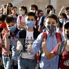 Дети в масках в школе в Дамаске, Сирия, 13 сентября (Фото: Синьхуа / ВИА)