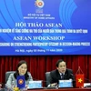 Директор Департамента международного сотрудничества Министерства внутренних дел Чу Туан Ту (справа) выступает на семинаре (Фото: ВИА)