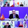 Премьер-министр Нгуен Суан Фук принял участие в онлайн-саммите G20 (Фото: ВИА)