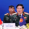 Министр обороны генерал Нго Суан Лить (в центре) выступает на 14-м совещании министров обороны стран АСЕАН 9 декабря (Фото: ВИА)