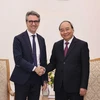 Премьер-министр Нгуен Суан Фук (справа) принял посла Джорджо Алиберти, главу делегации ЕС во Вьетнаме (Фото: ВИА)