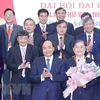 Премьер-министр Нгуен Суан Фук и делегаты на конференции (Фото: ВИА)