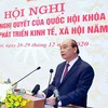 Премьер-министр Нгуен Суан Фук выступает на конференции (Источник: ВИА)