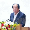 На пресс-конференции выступает министр, заеведующий Канцелярией правительства Май Тиен Зунг. (Фото: ВИА) 