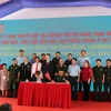 Представители Офиса Руководящего комитета 701 и USAID во Вьетнаме подписали соглашения о сотрудничестве по обмену информацией об усилиях всех сторон по обеззараживанию диоксинами (Фото: ВИА)