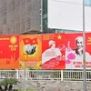 Плакаты установлены в Хошимине в честь XIII всевьетнамского съезда КПВ (Фото: ВИА)