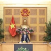 Премьер-министр Нгуен Суан Фук выступает на совещании. (Фото: ВИА)