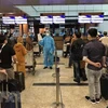 Посольство Вьетнама в Мьянме направило своих сотрудников прямо в аэропорт, чтобы помочь своим гражданам выполнить необходимые процедуры для посадки в самолет. (Фото: ВИА)