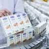 Молочная компания Vinamilk поставляет ореховые молочные продукты в Китай. (Фото: ВИА)