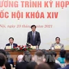 Генеральный секретарь НС, заведующий Канцелярией НС Нгуен Хань Фук выступает на пресс-конференции 23 марта. (Фото: ВИА)