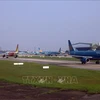 Самолеты в аэропорте Нойбай. (Фото: ВИА)