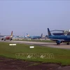 Парк самолетов на взлетно-посадочных полосах международного аэропорта Ханоя Нойбай. (Фото: ВИА)