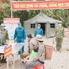 Ужесточение контроля границ - мера по предовращению проникновения эпидемии в страну. (Фото: baochinhphu.vn)