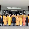 Президент Нгуен Суан Фук и члены делегации позируют фотографу (Фото: ВИА)