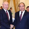 Во время встречи двух руководителей Вьетнама и России в мае 2019 г. (Фото: Тхонг Нят/ВИА)
