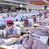 Рабочие швейно-текстильной фабрики во Вьетнаме (Фото: ВИА)