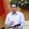 Премьер-министр Фам Минь Тьинь председательствовал на заседании. (Фото: ВИА)