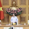 Премьер-министр Фам Минь Тьинь председательствовал на совещании во второй половине дня 18 августа. (Фото: Зыонг Жанг/ВИА)