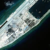 Спутниковый снимок рифа Огненный крест (Файери-Кросс), архипелаг Чыонгша (Спратли) Вьетнама. (Фото: DigitalGlobe)