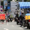 Пункт пропуска на улице Конгхоа (район Танбинь). (Фото: Тхань Ву / ВИА)