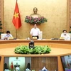 Премьер-министр Фам Минь Тьинь председательствует на августовском заседании правительства (Фото: ВИA)
