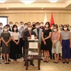 Вьетнамцы в Японии собирают средства в поддержку фонда вакцины COVID-19 во Вьетнаме. (Фото: ВИА)