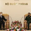 Генерал-полковник Хоанг Суан Тьиен (српава) и посол Китая Сюн Бо на приеме. (Фото: ВИА)