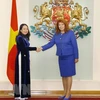 Вице-президент Во Тхи Ань Суан (слева) и ее болгарская коллега Илиана Иотова (Фото: Фыонг Хоа/ВИА)