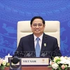 Премьер-министр Фам Минь Тьинь на 24-м онлайн-саммите АСЕАН + 3. (Фото: Зыонг Жанг/ВИА)
